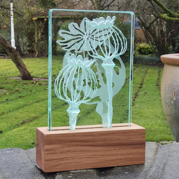 Poppy design engraved glass and oiled oak wood LED table light by Tim Carter