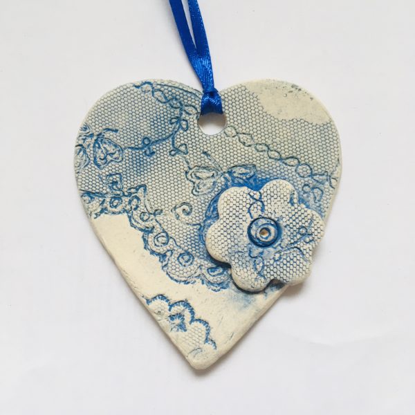 Light blue hanging heart with flower