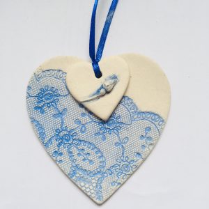 Pale blue double heart with flower addition
