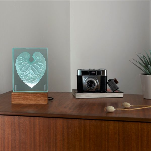 Engraved glass table light with heart design by Tim Carter