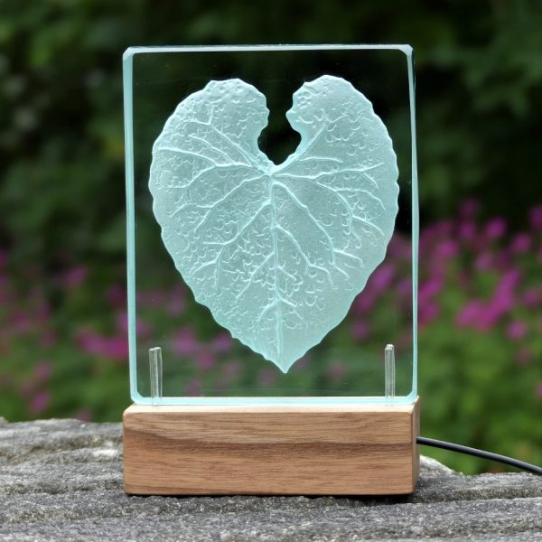 Engraved glass table light with heart design by Tim Carter